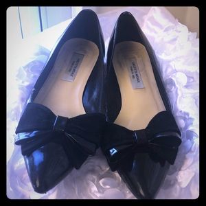 Patent with Suede bow!! Very classy and beautiful
